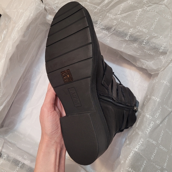 DKNY Buckled Straps Accent Combat Boots. Black Leather and Silver-Tone Metal. 7. - Picture 15 of 15